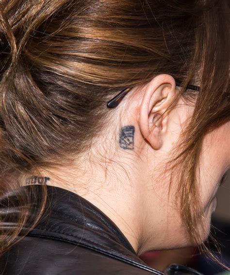 Dakota Johnson Tattoo Guide To Every Meaning & Location